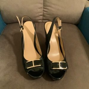 Tommy Hilfiger women size 10 black leather platform wedge sandals.